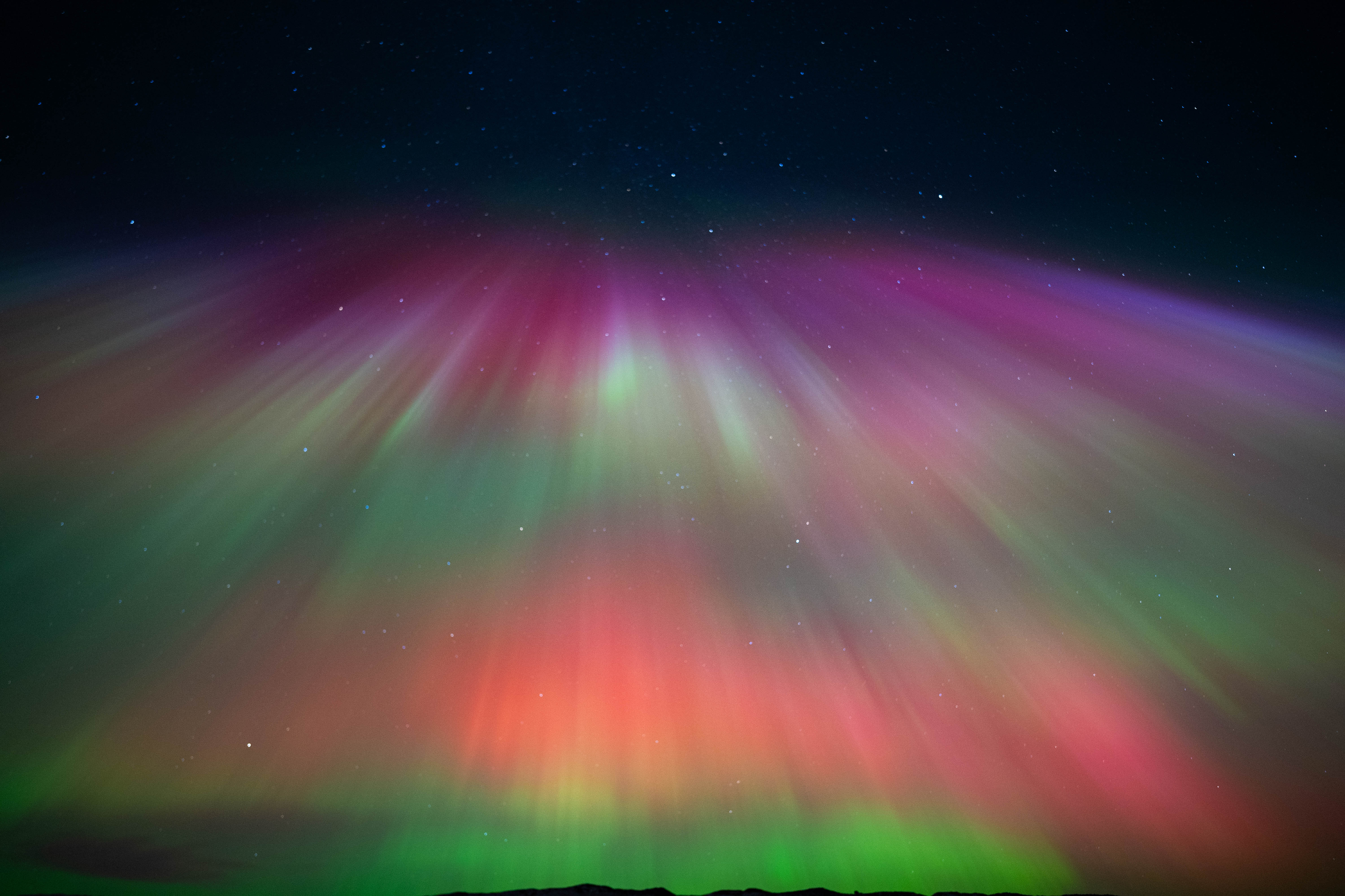 Aurora river flowing above Icelandic highlands